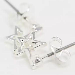 Saint Lola silver plated star earrings